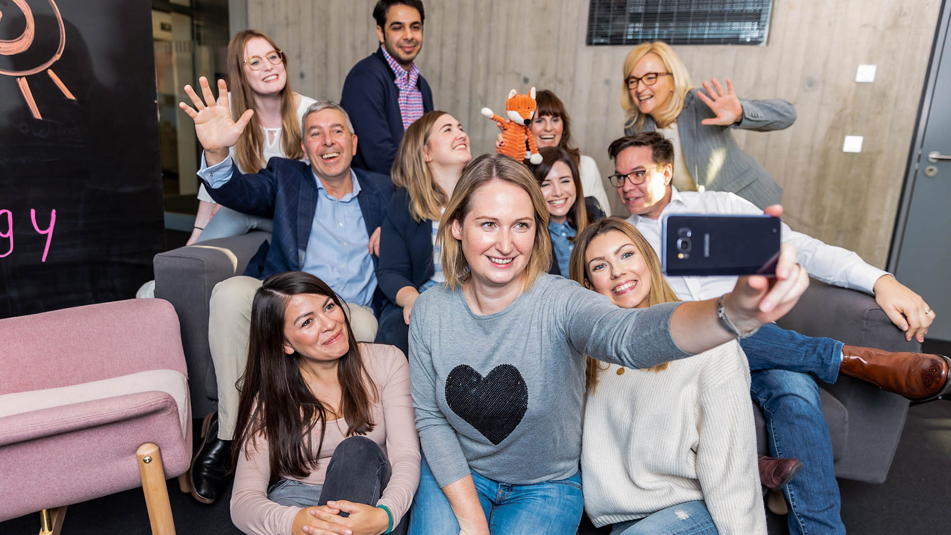 imc employees gather to take a selfie