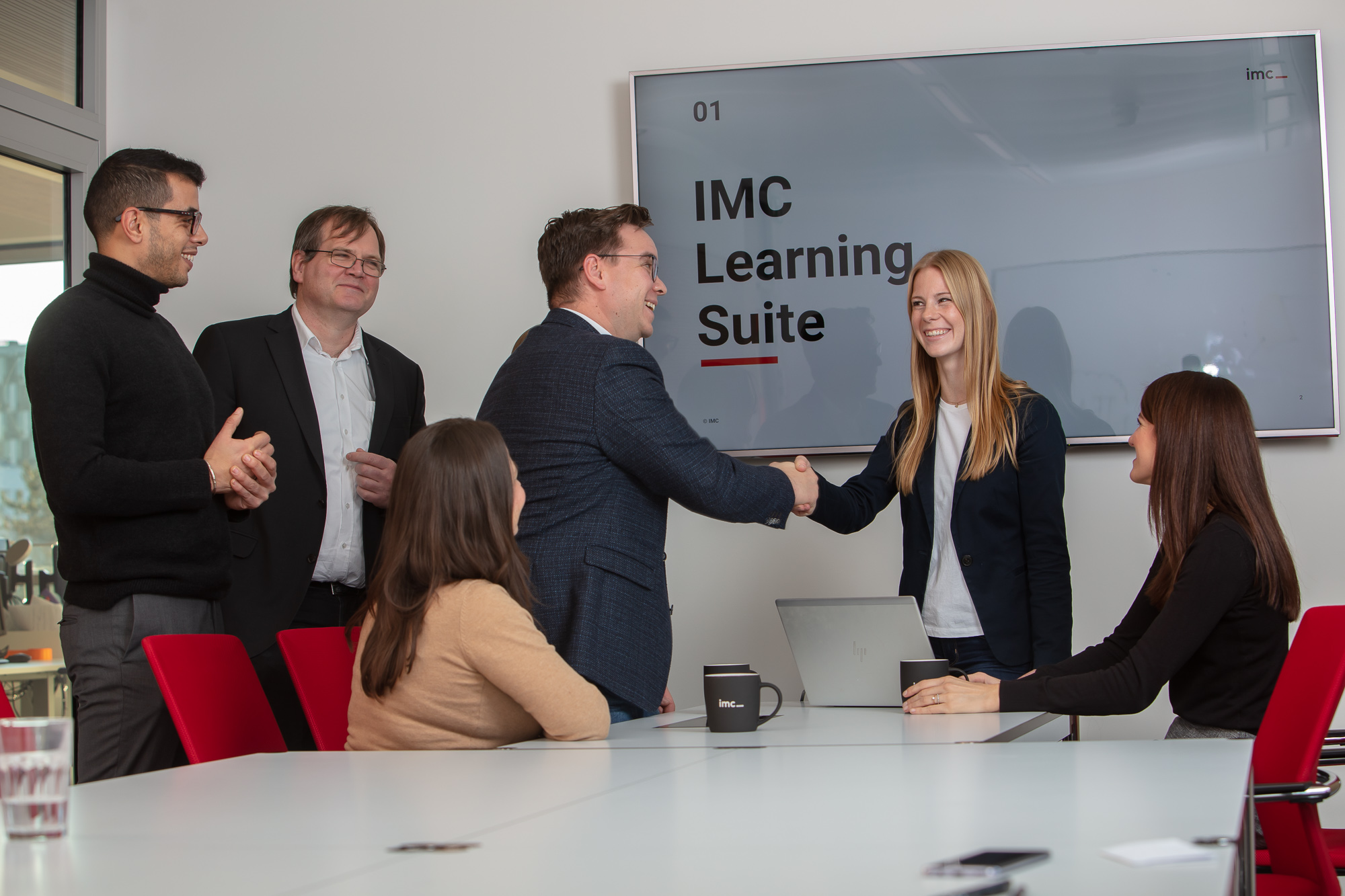 employees shaking hands