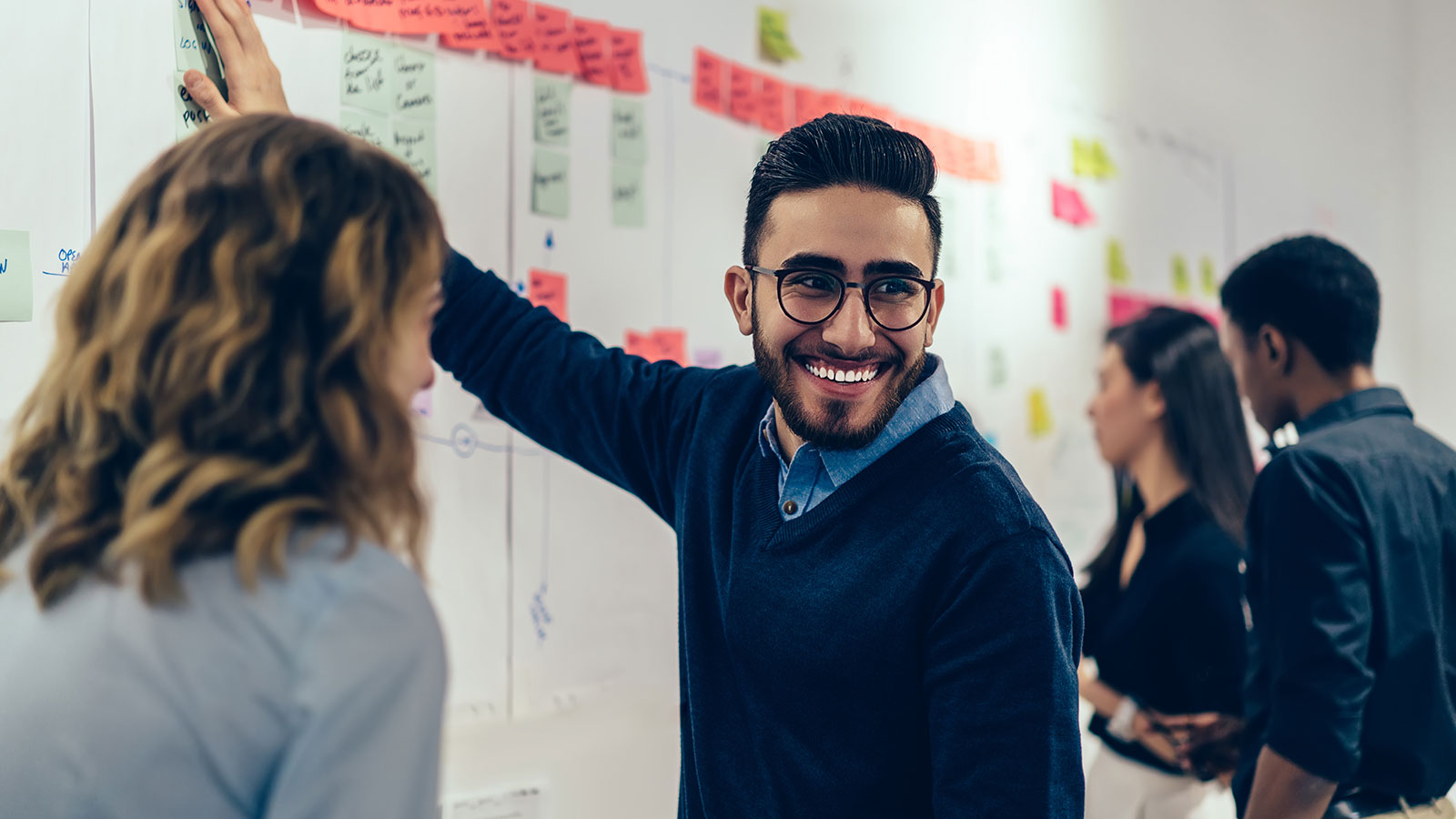 Happy co-worker in a workshop