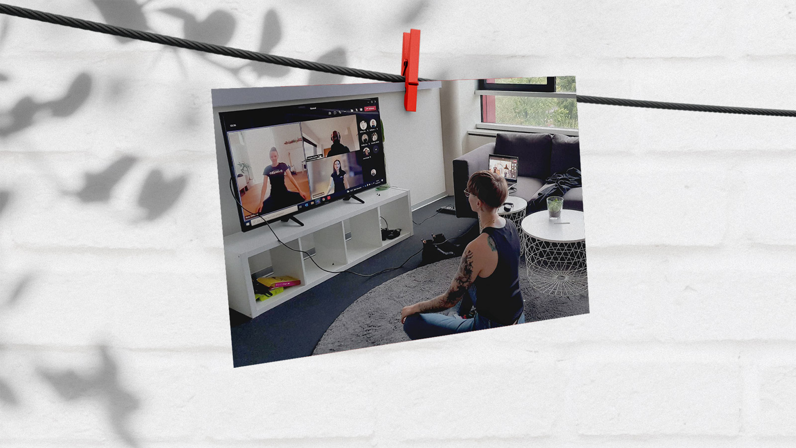 employee leading an online yoga session