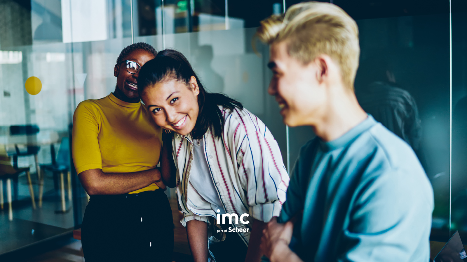 happy colleagues in a psychologically safe workplace