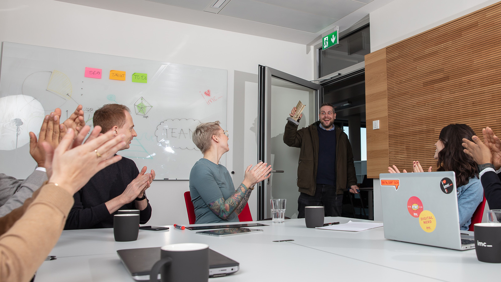 imc employee showing award