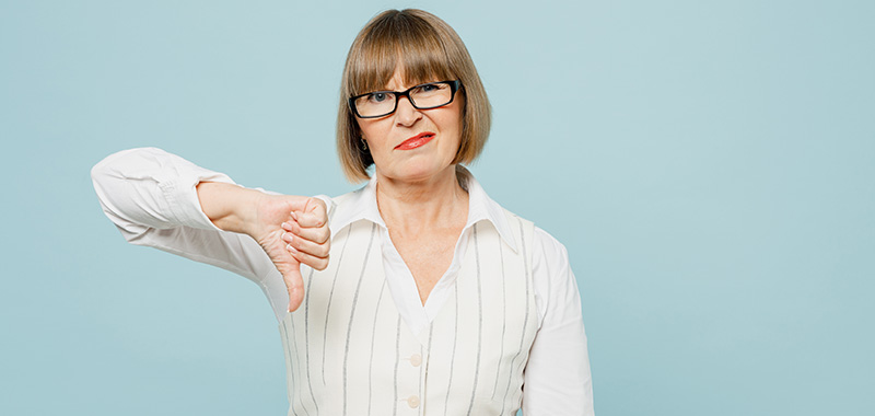 woman giving thumbs down