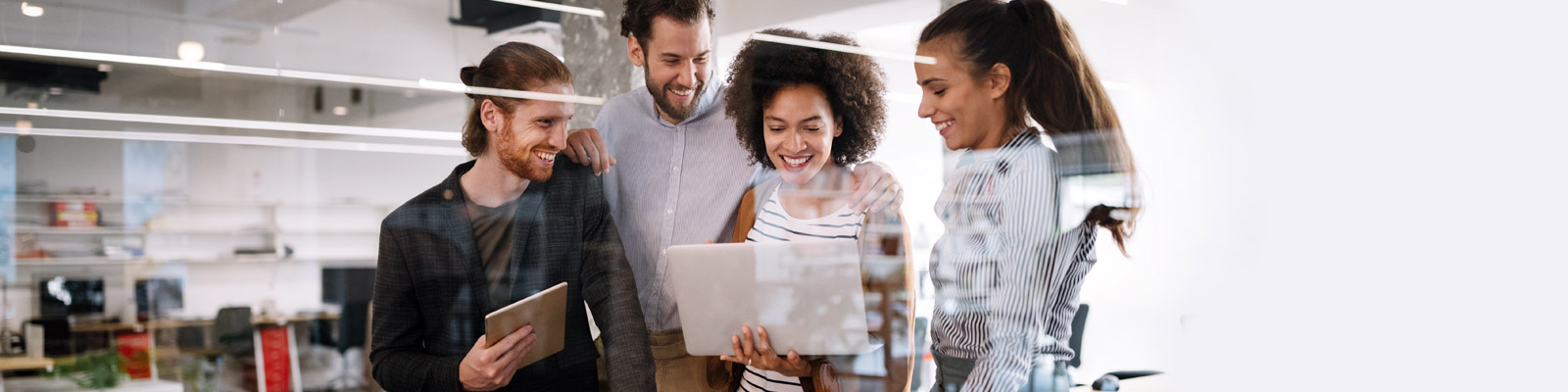 colleagues cellebrating Digital Learning Transformation