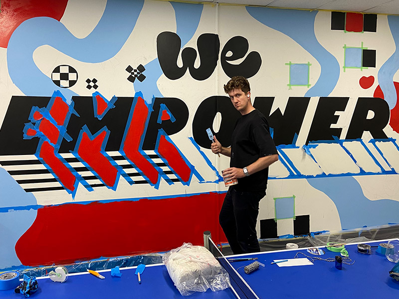 adam from imc austalia doing a wall picture