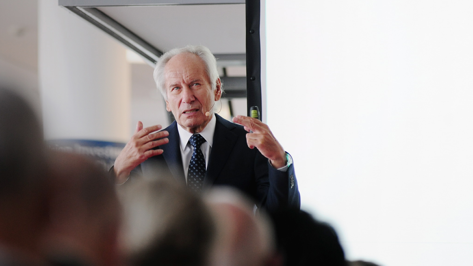 Professor Scheer speaking in public