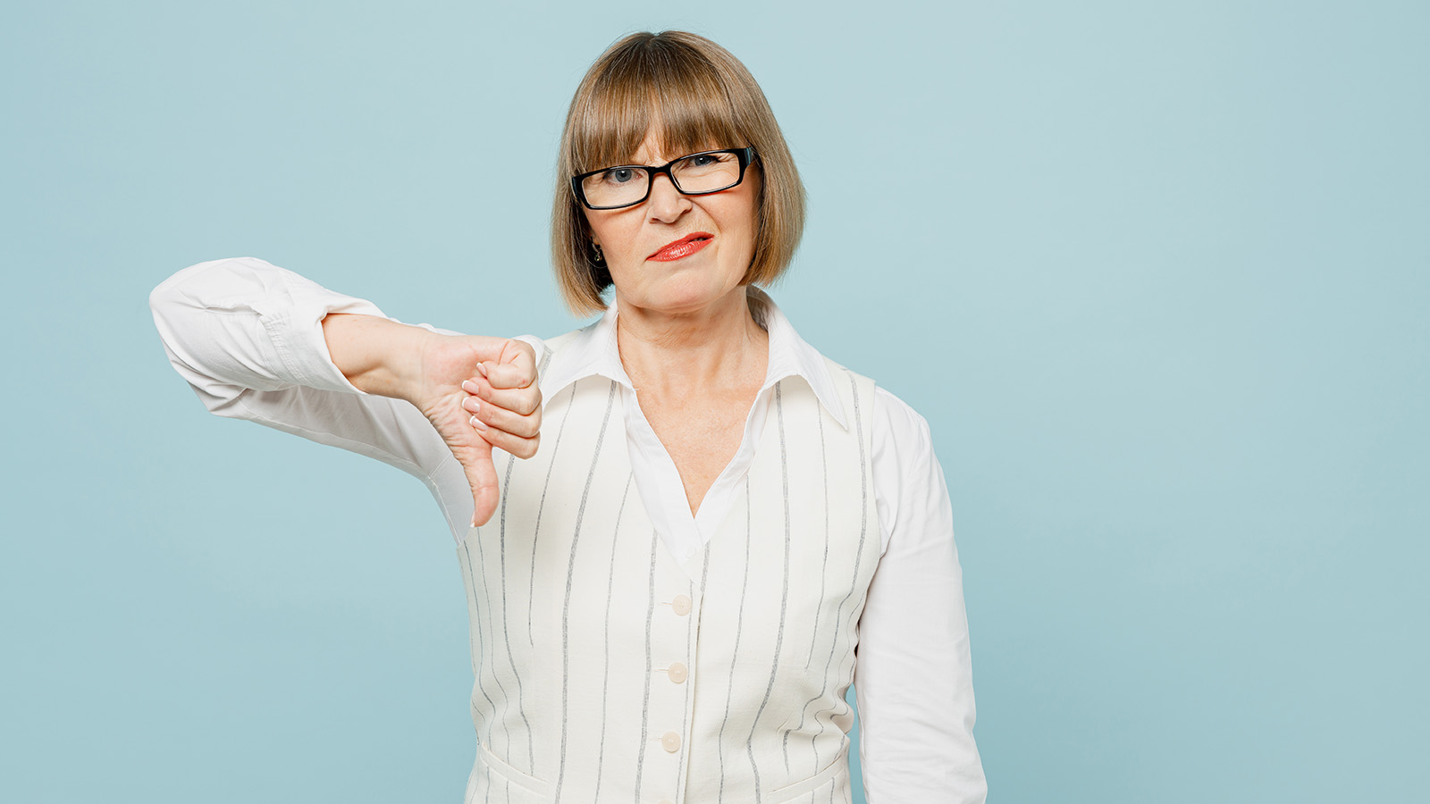 woman giving thumbs down
